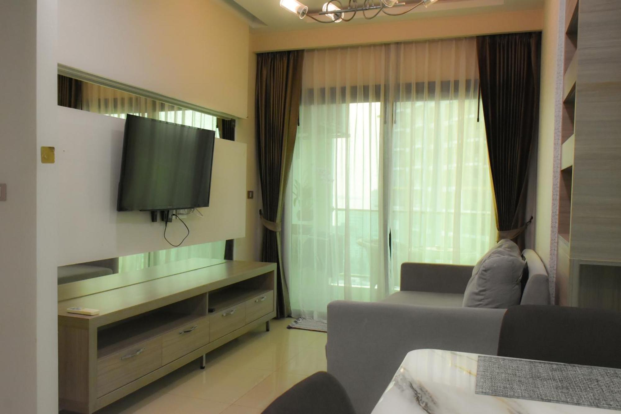 Dusit Grand Condo View Джомтьєн-Біч Номер фото