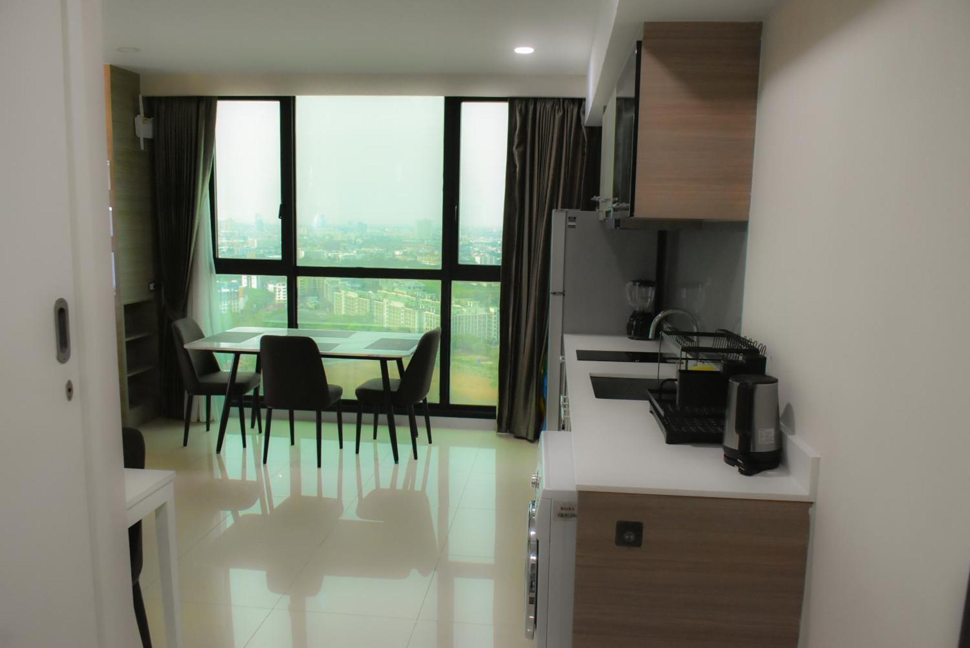 Dusit Grand Condo View Джомтьєн-Біч Номер фото