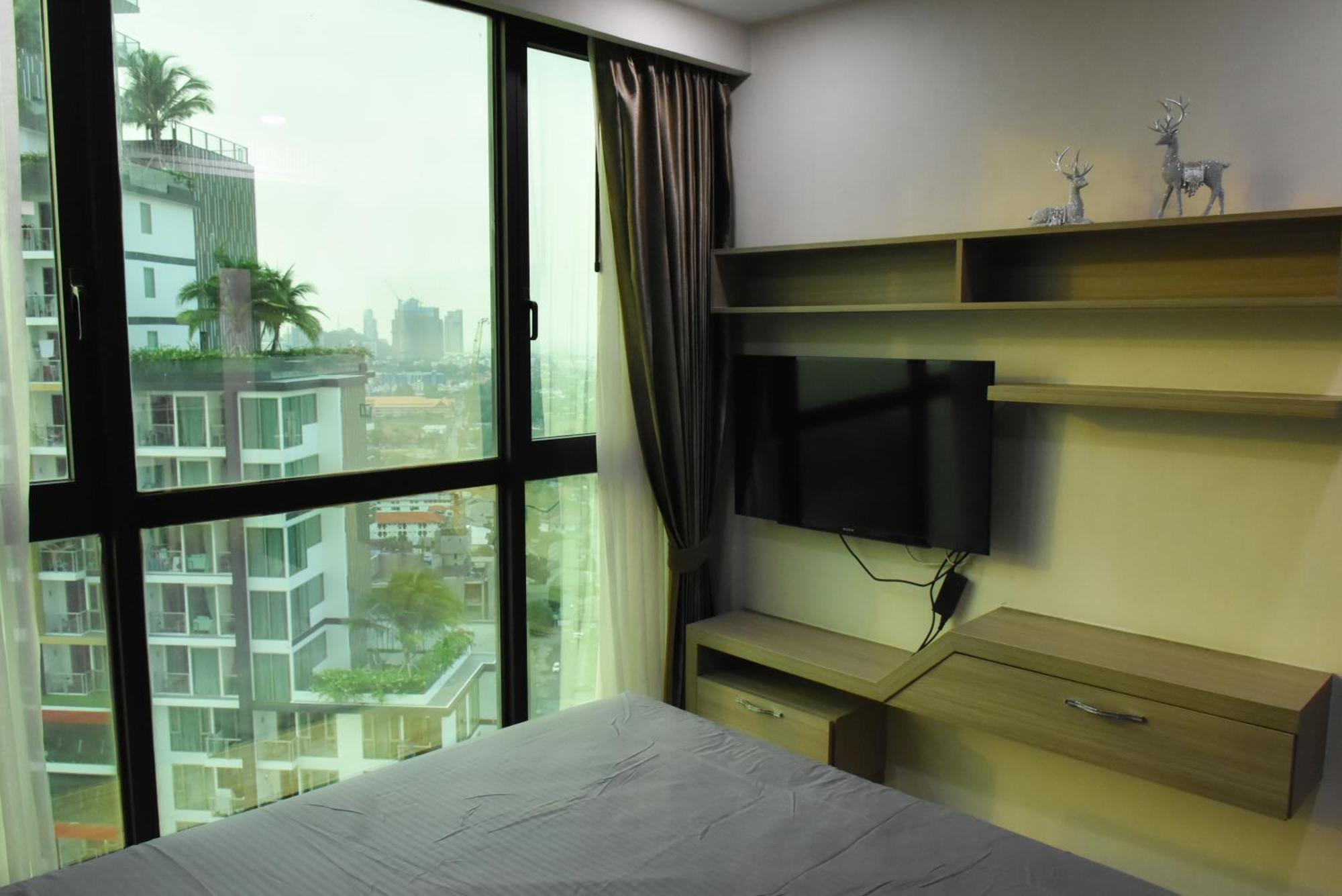 Dusit Grand Condo View Джомтьєн-Біч Номер фото